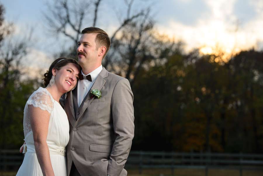 bride and groom during sunset